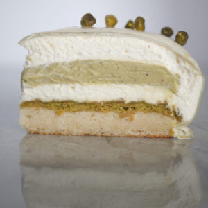 Pistachio and vanilla mousse cake